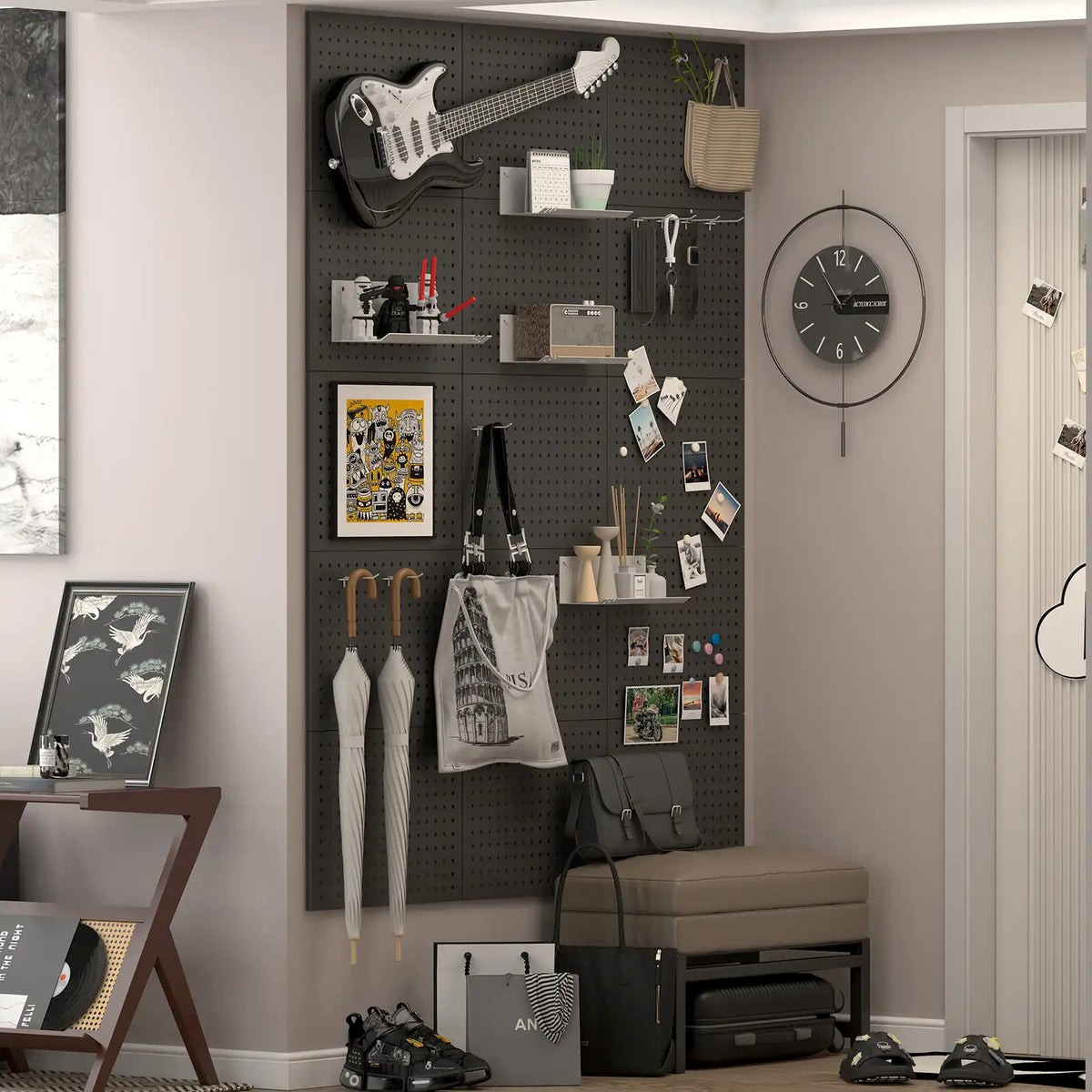 Home entryway wall featuring dark metal pegboard panels displaying a guitar bags and decorative items.