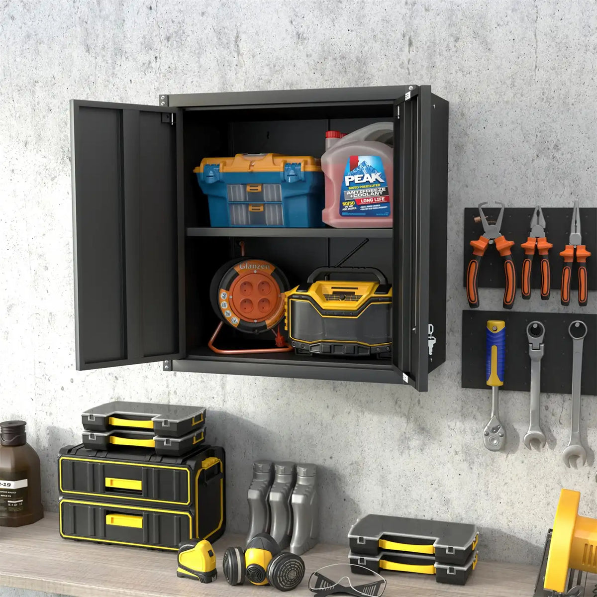 Front view of the black steel wall storage cupboard securely mounted on a industrial concrete garage wall.