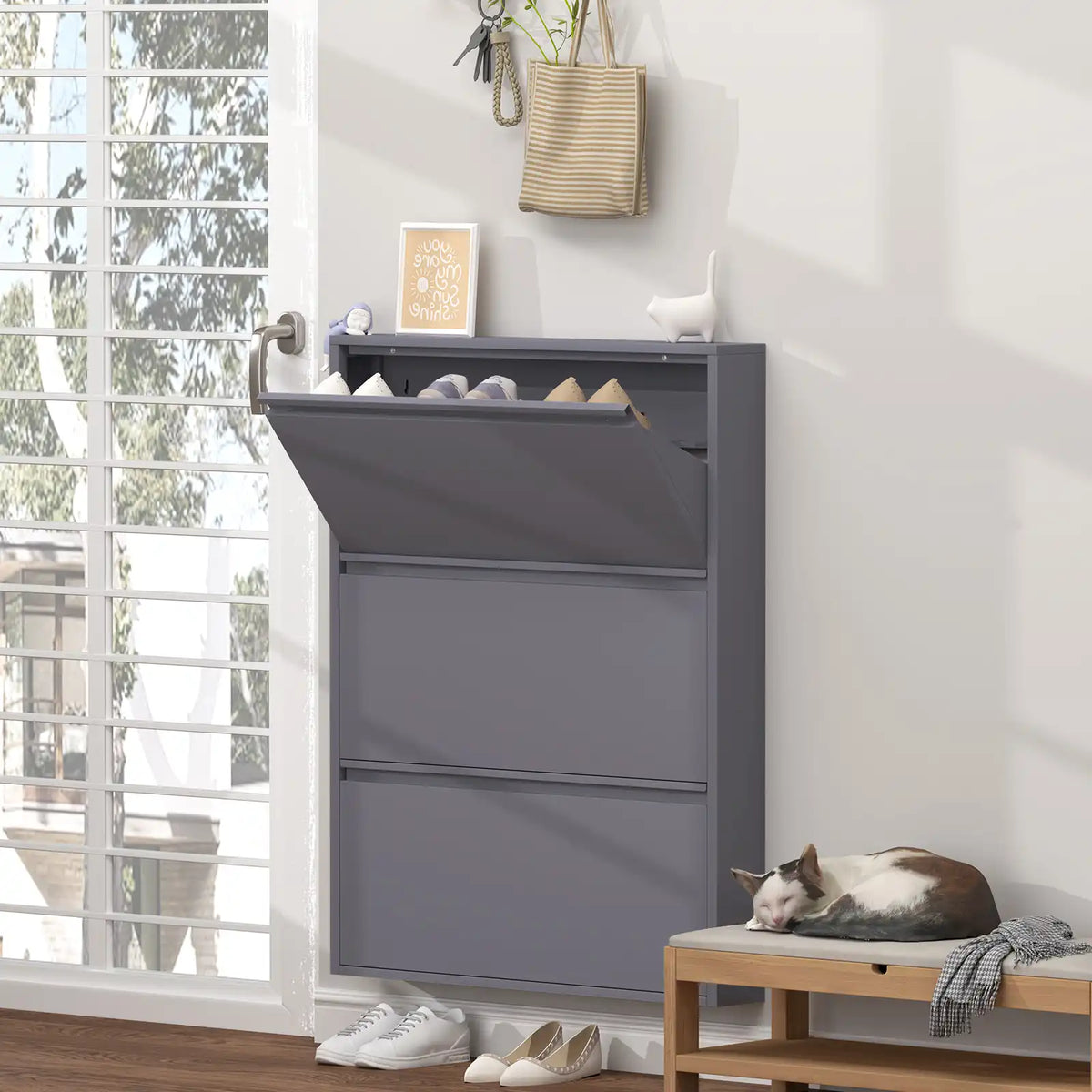 Sleek Grey 3 Tier Shoe Storage Cabinet bathed in natural sunlight by the front doorway. #grey #3 flip drawers