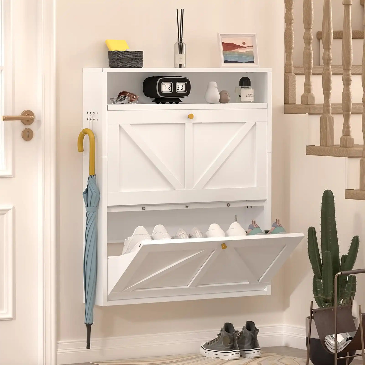 modern white shoe cabinet with 2 flip drawers placed in a bright entryway with shoes neatly organized