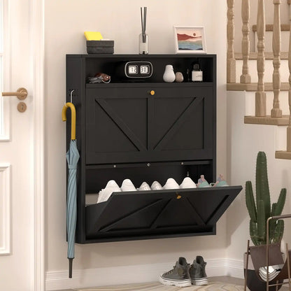 sleek black narrow shoe cabinet featuring 2 tilt-out drawers styled in a modern entryway layout