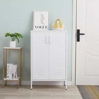 A closed white entryway storage cabinet near the front door holding a bag, and daily essentials.